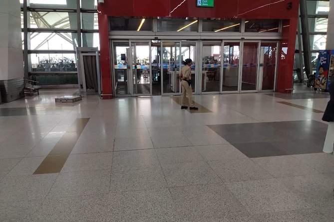 Arrival Meet & Assist service at Delhi Airport with optional Private transfer - Porter Help and the Human Factor: Getting to Your Driver Without the Panic