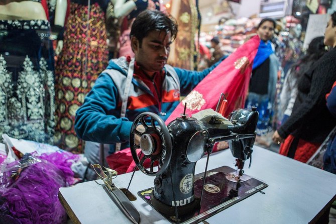 Delhi Food Walk: Rickshaw Ride, Street Eats & Market Tour - Kamla Nagar on foot, with a cycle rickshaw reset