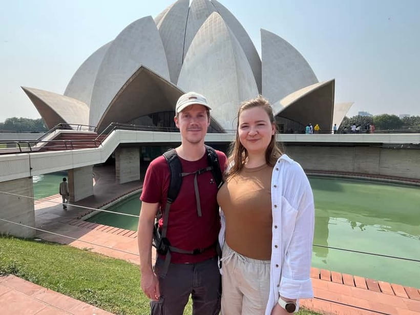 Delhi: Private Old & New Delhi Guided Half- or Full-Day Tour - Red Fort (outside) and Raj Ghat: history in the background, not a museum crawl