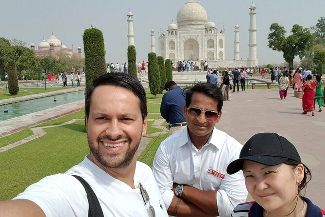 Taj Mahal & Agra Fort Car Tour from Delhi with 5</em> Meals – Itimad-ud-Daulah (Baby Taj) in 30 minutes: smaller, still worth it’ /><br />
After lunch, you go to <strong>Itimad-ud-Daulah</strong>, often called the <strong>Baby Taj</strong>. Your guided time here is about <strong>30 minutes</strong>, and entry is included.</p>
<p><p>This is the “finishing touch” stop. It’s not as large as the Taj Mahal, so it can be tempting to think it’s optional. But when you’ve already seen the big monument, Baby Taj becomes a study in refinement—something you appreciate more if you’re not exhausted.</p>
</p>
<p><p>This short timing window is actually a benefit. It keeps the day from dragging while still letting you:</p>
</p>
<ul>
<li>see the guided highlights,</li>
<li>take your own photos,</li>
<li>and close the tour with a calmer moment after the fort.</li>
</ul>
<p><p>If you want the best experience here, slow down for the key details your guide points out. Baby Taj rewards careful looking, and 30 minutes is enough when you stay focused.</p>
</p>
<h2 id="what-your-guide-and-driver-quality-usually-means-for-you">What your guide and driver quality usually means for you</h2>
<p>A theme across the best days on this tour is that the guide does two things well: explains what you’re seeing and helps you get the photo moments without chaos. In this experience, guide names like <strong>Kamran</strong>, <strong>Rashid</strong>, <strong>Owais</strong>, <strong>Shaan</strong>, <strong>Amir</strong>, <strong>Zuber</strong>, <strong>Naresh</strong>, <strong>Shuaib</strong>, <strong>Rahul</strong>, and <strong>Sanjay</strong> show up in the strongest outcomes tied to clear storytelling and patient pacing.</p>
<p><p>I can’t promise which guide you’ll get, but you can increase your odds of a smooth day by doing two simple things:</p>
</p>
<ul>
<li>Ask what you should focus on first at the Taj so you don’t waste time deciding.</li>
<li>Tell your guide if you want more photo time or more explanations, then follow their suggested route.</li>
</ul>
<p><p>For the driver side, the best feedback pairs often mention safe, efficient driving and punctual pickup. That’s huge on a day that’s only 12 hours long and has early-morning timing options.</p>
</p>
<p><p>Also bring a <strong>valid photo ID</strong>—you’ll need it for monument checking.</p>
</p>
<h2 id="timing-tips-sunrise-works-friday-changes-everything">Timing tips: sunrise works, Friday changes everything</h2>
<p>If you can handle an early start, sunrise is usually the best move for the Taj Mahal. You’ll arrive closer to opening time, which helps you beat the densest crowds. The marble also changes color as the light shifts, so the earlier you go, the more you benefit from that effect.</p>
<p><p>If your travel dates include <strong>Friday</strong>, you’ll need a plan because the Taj Mahal is closed. You can still do the tour, but don’t count on a Taj visit that day.</p>
</p>
<p><p>If you don’t want sunrise, choose a later departure. You’ll spend more of the day in traffic and heat, but you’ll likely enjoy the monuments at a more comfortable pace. Either way, drink water and take your time inside.</p>
</p>
<h2 id="should-you-book-this-taj-mahal-and-agra-fort-car-tour">Should you book this Taj Mahal and Agra Fort car tour?</h2>
<p>Book it if:</p>
<ul>
<li>You want a <strong>private</strong> day with pickup from your area and an air-conditioned car.</li>
<li>You care about getting into the Taj Mahal without ticket-line stress.</li>
<li>You want a break that’s more than a roadside snack—<strong>a 5-star buffet meal</strong> at DoubleTree makes a big difference on a long day.</li>
<li>You like the idea of finishing with <strong>Baby Taj</strong> rather than stopping after the big one.</li>
</ul>
<p><p>Skip it (or adjust expectations) if:</p>
</p>
<ul>
<li>You strongly dislike early mornings or long transit days. This is a 12-hour loop with about 3 hours each way.</li>
<li>Your dates include <strong>Friday</strong> and Taj Mahal is the only thing you came for.</li>
<li>You’re traveling super budget-tight for drinks, since lunch includes food but drinks are not included.</li>
</ul>
<p><p>If you’re on your first trip to Agra, this layout is a solid use of time: Taj Mahal first, then Agra Fort, then Itimad-ud-Daulah, with the comfort and structure you need to enjoy it instead of just racing through.</p>
</p>
<h2 id="faq">FAQ</h2>
<h3 id="how-long-is-the-tour-from-delhi-to-agra">How long is the tour from Delhi to Agra?</h3>
<p>It runs for about <strong>12 hours</strong> (approx.), including the drive time from Delhi to Agra and back, plus visits and the meal stop.</p>
<h3 id="what-sites-are-included-in-agra">What sites are included in Agra?</h3>
<p>You’ll visit the <strong>Taj Mahal</strong>, <strong>Agra Fort</strong>, and <strong>Itmad-ud-Daulah (Baby Taj)</strong>, with guided time at each stop.</p>
<h3 id="are-monument-entry-fees-included">Are monument entry fees included?</h3>
<p>Yes, entry is included if you choose the option that includes <strong>monument tickets</strong>. There is also an option to include entry fees.</p>
<h3 id="is-the-meal-included">Is the meal included?</h3>
<p>The meal is included if you select the option that includes a meal. The stop is at <strong>DoubleTree by Hilton Hotel Agra</strong> for a buffet breakfast or lunch.</p>
<h3 id="do-i-need-to-stand-in-line-for-tickets">Do I need to stand in line for tickets?</h3>
<p>Your guide provides your entry passes and tickets for the Taj Mahal and Agra Fort so you can avoid ticket lines.</p>
<h3 id="what-areas-in-the-delhi-region-can-they-pick-up-from">What areas in the Delhi region can they pick up from?</h3>
<p>Pickup is offered from <strong>Delhi, Noida, Gurugram, Ghaziabad, and Faridabad</strong>, and also drop-off anywhere in those areas.</p>
<h3 id="what-car-will-we-ride-in">What car will we ride in?</h3>
<p>Car type depends on your group size: a four-seater sedan (1–2 people), six-seater wagon (3–5), nine-seater van (6–9), or twelve-seater van (10–12).</p>
<h3 id="is-the-taj-mahal-open-every-day">Is the Taj Mahal open every day?</h3>
<p>No. The <strong>Taj Mahal is closed every Friday</strong>.</p>
<h3 id="what-id-do-i-need-for-entry">What ID do I need for entry?</h3>
<p>Bring a <strong>valid photo ID</strong> for monument checking.</p>
<h3 id="can-i-cancel-and-get-a-full-refund">Can I cancel and get a full refund?</h3>
<p>Yes. You can cancel up to <strong>24 hours in advance</strong> for a full refund. Canceling less than 24 hours before the start time is not refunded.</p>
<div class="sb-related-posts"><h3>You Might Also Enjoy</h3><div class="sb-related-grid"><a href="https://thenewdelhiguide.com/taj-mahal-agra-private-day-tour-from-delhi-all-inclusive/" class="sb-related-item"><img decoding="async" width="300" height="200" src="https://thenewdelhiguide.com/wp-content/uploads/2026/06/taj-mahal-agra-private-day-tour-from-delhi-all-inclusive-400x267.jpg" class="attachment-medium size-medium wp-post-image" alt="Taj Mahal & Agra Private Day Tour from Delhi - All Inclusive - The ride between Delhi and Agra: where your comfort buys time" loading="lazy" srcset="https://thenewdelhiguide.com/wp-content/uploads/2026/06/taj-mahal-agra-private-day-tour-from-delhi-all-inclusive-400x267.jpg 400w, https://thenewdelhiguide.com/wp-content/uploads/2026/06/taj-mahal-agra-private-day-tour-from-delhi-all-inclusive.jpg 669w" sizes="auto, (max-width: 300px) 100vw, 300px" /><span>Taj Mahal & Agra Private Day Tour from Delhi – All Inclusive</span></a><a href="https://thenewdelhiguide.com/5-nights-6-days-private-golden-triangle-tour-delhi-agra-jaipur/" class="sb-related-item"><img decoding="async" width="300" height="200" src="https://thenewdelhiguide.com/wp-content/uploads/2026/06/5-nights-6-days-private-golden-triangle-tour-delhi-agra-jaipur-400x267.jpg" class="attachment-medium size-medium wp-post-image" alt="5 Nights 6 Days Private Golden Triangle Tour - Delhi Agra Jaipur - Delhi day 1: Gurudwara Bangla Sahib and Agrasen Ki Baoli" loading="lazy" srcset="https://thenewdelhiguide.com/wp-content/uploads/2026/06/5-nights-6-days-private-golden-triangle-tour-delhi-agra-jaipur-400x267.jpg 400w, https://thenewdelhiguide.com/wp-content/uploads/2026/06/5-nights-6-days-private-golden-triangle-tour-delhi-agra-jaipur.jpg 669w" sizes="auto, (max-width: 300px) 100vw, 300px" /><span>5 Nights 6 Days Private Golden Triangle Tour – Delhi Agra Jaipur</span></a><a href="https://thenewdelhiguide.com/four-day-luxury-golden-triangle-tour-to-agra-jaipur-from-delhi/" class="sb-related-item"><img decoding="async" width="300" height="200" src="https://thenewdelhiguide.com/wp-content/uploads/2026/06/four-day-luxury-golden-triangle-tour-to-agra-jaipur-from-delhi-400x267.jpg" class="attachment-medium size-medium wp-post-image" alt="Four-Day Luxury Golden Triangle Tour to Agra & Jaipur From Delhi - The private car and guided flow: your stress level stays low" loading="lazy" srcset="https://thenewdelhiguide.com/wp-content/uploads/2026/06/four-day-luxury-golden-triangle-tour-to-agra-jaipur-from-delhi-400x267.jpg 400w, https://thenewdelhiguide.com/wp-content/uploads/2026/06/four-day-luxury-golden-triangle-tour-to-agra-jaipur-from-delhi.jpg 669w" sizes="auto, (max-width: 300px) 100vw, 300px" /><span>Four-Day Luxury Golden Triangle Tour to Agra & Jaipur From Delhi</span></a><a href="https://thenewdelhiguide.com/private-sunrise-taj-mahal-agra-tour-from-delhi-by-luxury-car/" class="sb-related-item"><img decoding="async" width="300" height="200" src="https://thenewdelhiguide.com/wp-content/uploads/2026/06/private-sunrise-taj-mahal-agra-tour-from-delhi-by-luxury-car-400x267.jpg" class="attachment-medium size-medium wp-post-image" alt="Private Sunrise Taj Mahal & Agra Tour from Delhi by Luxury Car - Hotel pickup and a private car that saves your energy" loading="lazy" srcset="https://thenewdelhiguide.com/wp-content/uploads/2026/06/private-sunrise-taj-mahal-agra-tour-from-delhi-by-luxury-car-400x267.jpg 400w, https://thenewdelhiguide.com/wp-content/uploads/2026/06/private-sunrise-taj-mahal-agra-tour-from-delhi-by-luxury-car.jpg 669w" sizes="auto, (max-width: 300px) 100vw, 300px" /><span>Private Sunrise Taj Mahal & Agra Tour from Delhi by Luxury Car</span></a></div></div></div><aside class="ndg-post-sidebar">    <div class="ndg-booking">
                    <a class="ndg-booking-image" href="https://www.viator.com/tours/New-Delhi/Wake-Up-Early-Morning-and-Visit-Taj-Mahal-for-Sunrise-View-with-Approved-Guide/d804-63011P4" target="_blank" rel="nofollow noopener sponsored" aria-label="Taj Mahal & Agra Fort Car Tour from Delhi with 5* Meals">
                <img decoding="async" src="https://thenewdelhiguide.com/wp-content/uploads/2026/06/taj-mahal-agra-fort-car-tour-from-delhi-with-5-meals.jpg" alt="" loading="lazy" />
            </a>
                <div class="ndg-booking-body">
                    <p class="ndg-booking-platform">Official tickets via <strong>Viator</strong></p>
                            <p class="ndg-booking-price">From <strong>$33.75</strong> <span>per person</span></p>
        
        <p class="ndg-booking-section-label">Check Availability</p>
        <div class="ndg-booking-dates">
                            <a class="ndg-booking-date ndg-booking-date--today" href="https://www.viator.com/tours/New-Delhi/Wake-Up-Early-Morning-and-Visit-Taj-Mahal-for-Sunrise-View-with-Approved-Guide/d804-63011P4" target="_blank" rel="nofollow noopener sponsored">
                    <span class="day">Thu</span>
                    <span class="date">4 Jun</span>
                </a>
                            <a class="ndg-booking-date" href="https://www.viator.com/tours/New-Delhi/Wake-Up-Early-Morning-and-Visit-Taj-Mahal-for-Sunrise-View-with-Approved-Guide/d804-63011P4" target="_blank" rel="nofollow noopener sponsored">
                    <span class="day">Fri</span>
                    <span class="date">5 Jun</span>
                </a>
                            <a class="ndg-booking-date" href="https://www.viator.com/tours/New-Delhi/Wake-Up-Early-Morning-and-Visit-Taj-Mahal-for-Sunrise-View-with-Approved-Guide/d804-63011P4" target="_blank" rel="nofollow noopener sponsored">
                    <span class="day">Sat</span>
                    <span class="date">6 Jun</span>
                </a>
                            <a class="ndg-booking-date" href="https://www.viator.com/tours/New-Delhi/Wake-Up-Early-Morning-and-Visit-Taj-Mahal-for-Sunrise-View-with-Approved-Guide/d804-63011P4" target="_blank" rel="nofollow noopener sponsored">
                    <span class="day">Sun</span>
                    <span class="date">7 Jun</span>
                </a>
                        <a class="ndg-booking-date ndg-booking-date--more" href="https://www.viator.com/tours/New-Delhi/Wake-Up-Early-Morning-and-Visit-Taj-Mahal-for-Sunrise-View-with-Approved-Guide/d804-63011P4" target="_blank" rel="nofollow noopener sponsored" aria-label="See all dates">
                <svg width="18" height="18" viewBox="0 0 24 24" fill="none" stroke="currentColor" stroke-width="2" stroke-linecap="round" stroke-linejoin="round" aria-hidden="true">
                    <rect x="3" y="4" width="18" height="18" rx="2" ry="2"></rect>
                    <line x1="16" y1="2" x2="16" y2="6"></line>
                    <line x1="8"  y1="2" x2="8"  y2="6"></line>
                    <line x1="3"  y1="10" x2="21" y2="10"></line>
                </svg>
            </a>
        </div>

        <a class="ndg-booking-cta" href="https://www.viator.com/tours/New-Delhi/Wake-Up-Early-Morning-and-Visit-Taj-Mahal-for-Sunrise-View-with-Approved-Guide/d804-63011P4" target="_blank" rel="nofollow noopener sponsored">Book on Viator &rarr;</a>

                    <p class="ndg-booking-rating">
                <span class="ndg-stars" aria-label="Rating: 5.0 out of 5">
                    <span class="ndg-stars-bg" aria-hidden="true">★★★★★</span>
                    <span class="ndg-stars-fg" aria-hidden="true" style="width: 100%">★★★★★</span>
                </span>
                <strong>5.0</strong>
                <span class="reviews">(322 reviews)</span>            </p>
        
        <p class="ndg-booking-note">Reviewed by The New Delhi Guide.<br>Booking Through Viator.</p>
        </div>
    </div>
    </aside></div><div style="margin: 20px 0; padding: 15px 0;"><h3>More Tours in New Delhi</h3><ul style="margin: 10px 0; padding: 0; list-style: none;"><li style="margin: 0 0 10px 0; padding: 0 0 10px 0; border-bottom: 1px solid #eee; display: flex; align-items: flex-start; gap: 12px; line-height: 1.4;"><a href="https://thenewdelhiguide.com/old-new-delhi-city-tour-half-or-full-day-options-available/" aria-hidden="true" tabindex="-1"><img decoding="async" style="width: 80px; height: 60px; object-fit: cover; border-radius: 4px; flex-shrink: 0;" src="https://thenewdelhiguide.com/wp-content/uploads/2026/06/old-new-delhi-city-tour-half-or-full-day-options-available-150x150.jpg" alt="" loading="lazy"></a><div><a href="https://thenewdelhiguide.com/old-new-delhi-city-tour-half-or-full-day-options-available/">Old & New Delhi City Tour – Half or Full Day Options Available</a><br><span style="font-size: 0.82em; color: #555; margin-top: 2px;"><span style="color: #f5a623;">★</span> 5.0 &middot; 4,811 reviews</span></div></li><li style="margin: 0 0 10px 0; padding: 0 0 10px 0; border-bottom: 1px solid #eee; display: flex; align-items: flex-start; gap: 12px; line-height: 1.4;"><a href="https://thenewdelhiguide.com/same-day-taj-mahal-agra-fort-baby-taj-tour-from-delhi-by-car/" aria-hidden="true" tabindex="-1"><img decoding="async" style="width: 80px; height: 60px; object-fit: cover; border-radius: 4px; flex-shrink: 0;" src="https://thenewdelhiguide.com/wp-content/uploads/2026/06/same-day-taj-mahal-agra-fort-baby-taj-tour-from-delhi-by-car-150x150.jpg" alt="" loading="lazy"></a><div><a href="https://thenewdelhiguide.com/same-day-taj-mahal-agra-fort-baby-taj-tour-from-delhi-by-car/">Same Day Taj Mahal, Agra Fort & Baby Taj Tour from Delhi by Car</a><br><span style="font-size: 0.82em; color: #555; margin-top: 2px;"><span style="color: #f5a623;">★</span> 5.0 &middot; 4,304 reviews</span></div></li><li style="margin: 0 0 10px 0; padding: 0 0 10px 0; border-bottom: 1px solid #eee; display: flex; align-items: flex-start; gap: 12px; line-height: 1.4;"><a href="https://thenewdelhiguide.com/taj-mahal-day-tour-from-delhi-by-superfast-train-top-rated-tour/" aria-hidden="true" tabindex="-1"><img decoding="async" style="width: 80px; height: 60px; object-fit: cover; border-radius: 4px; flex-shrink: 0;" src="https://thenewdelhiguide.com/wp-content/uploads/2026/06/taj-mahal-day-tour-from-delhi-by-superfast-train-top-rated-tour-150x150.jpg" alt="" loading="lazy"></a><div><a href="https://thenewdelhiguide.com/taj-mahal-day-tour-from-delhi-by-superfast-train-top-rated-tour/">Taj Mahal Day Tour from Delhi by Superfast Train – TOP RATED TOUR</a><br><span style="font-size: 0.82em; color: #555; margin-top: 2px;"><span style="color: #f5a623;">★</span> 5.0 &middot; 4,166 reviews</span></div></li><li style="margin: 0 0 10px 0; padding: 0 0 10px 0; border-bottom: 1px solid #eee; display: flex; align-items: flex-start; gap: 12px; line-height: 1.4;"><a href="https://thenewdelhiguide.com/delhi-old-and-new-delhi-private-full-or-half-day-tour/" aria-hidden="true" tabindex="-1"><img decoding="async" style="width: 80px; height: 60px; object-fit: cover; border-radius: 4px; flex-shrink: 0;" src="https://thenewdelhiguide.com/wp-content/uploads/2026/06/delhi-old-and-new-delhi-private-full-or-half-day-tour-150x150.jpg" alt="" loading="lazy"></a><div><a href="https://thenewdelhiguide.com/delhi-old-and-new-delhi-private-full-or-half-day-tour/">Delhi: Old and New Delhi Private Full or Half-Day Tour</a><br><span style="font-size: 0.82em; color: #555; margin-top: 2px;"><span style="color: #f5a623;">★</span> 4.9 &middot; 3,776 reviews</span></div></li><li style="margin: 0 0 10px 0; padding: 0 0 10px 0; border-bottom: 1px solid #eee; display: flex; align-items: flex-start; gap: 12px; line-height: 1.4;"><a href="https://thenewdelhiguide.com/full-day-taj-mahal-agra-fort-baby-taj-tour-from-delhi-by-car/" aria-hidden="true" tabindex="-1"><img decoding="async" style="width: 80px; height: 60px; object-fit: cover; border-radius: 4px; flex-shrink: 0;" src="https://thenewdelhiguide.com/wp-content/uploads/2026/06/full-day-taj-mahal-agra-fort-baby-taj-tour-from-delhi-by-car-150x150.jpg" alt="" loading="lazy"></a><div><a href="https://thenewdelhiguide.com/full-day-taj-mahal-agra-fort-baby-taj-tour-from-delhi-by-car/">Full Day Taj Mahal, Agra Fort & Baby Taj Tour from Delhi by Car</a><br><span style="font-size: 0.82em; color: #555; margin-top: 2px;"><span style="color: #f5a623;">★</span> 5.0 &middot; 3,647 reviews</span></div></li><li style="margin: 0; padding: 0; border-bottom: none; display: flex; align-items: flex-start; gap: 12px; line-height: 1.4;"><a href="https://thenewdelhiguide.com/taj-mahal-tour-from-delhi-by-express-train-viator-award-winner/" aria-hidden="true" tabindex="-1"><img decoding="async" style="width: 80px; height: 60px; object-fit: cover; border-radius: 4px; flex-shrink: 0;" src="https://thenewdelhiguide.com/wp-content/uploads/2026/06/taj-mahal-tour-from-delhi-by-express-train-viator-award-winner-150x150.jpg" alt="" loading="lazy"></a><div><a href="https://thenewdelhiguide.com/taj-mahal-tour-from-delhi-by-express-train-viator-award-winner/">Taj Mahal Tour from Delhi by Express Train (Viator Award Winner)</a><br><span style="font-size: 0.82em; color: #555; margin-top: 2px;"><span style="color: #f5a623;">★</span> 5.0 &middot; 2,849 reviews</span></div></li></ul></div><div style="margin: 20px 0; padding: 15px 0;"><h3>More Tour Reviews in New Delhi</h3><ul style="margin: 10px 0; padding: 0; list-style: none;"><li style="margin: 0 0 10px 0; padding: 0 0 10px 0; border-bottom: 1px solid #eee; display: flex; align-items: flex-start; gap: 12px; line-height: 1.4;"><a href="https://thenewdelhiguide.com/old-new-delhi-city-tour-half-or-full-day-options-available/" aria-hidden="true" tabindex="-1"><img decoding="async" style="width: 80px; height: 60px; object-fit: cover; border-radius: 4px; flex-shrink: 0;" src="https://thenewdelhiguide.com/wp-content/uploads/2026/06/old-new-delhi-city-tour-half-or-full-day-options-available-150x150.jpg" alt="" loading="lazy"></a><div><a href="https://thenewdelhiguide.com/old-new-delhi-city-tour-half-or-full-day-options-available/">Old & New Delhi City Tour – Half or Full Day Options Available</a><br><span style="font-size: 0.82em; color: #555; margin-top: 2px;"><span style="color: #f5a623;">★</span> 5.0 &middot; 4,811 reviews</span></div></li><li style="margin: 0 0 10px 0; padding: 0 0 10px 0; border-bottom: 1px solid #eee; display: flex; align-items: flex-start; gap: 12px; line-height: 1.4;"><a href="https://thenewdelhiguide.com/same-day-taj-mahal-agra-fort-baby-taj-tour-from-delhi-by-car/" aria-hidden="true" tabindex="-1"><img decoding="async" style="width: 80px; height: 60px; object-fit: cover; border-radius: 4px; flex-shrink: 0;" src="https://thenewdelhiguide.com/wp-content/uploads/2026/06/same-day-taj-mahal-agra-fort-baby-taj-tour-from-delhi-by-car-150x150.jpg" alt="" loading="lazy"></a><div><a href="https://thenewdelhiguide.com/same-day-taj-mahal-agra-fort-baby-taj-tour-from-delhi-by-car/">Same Day Taj Mahal, Agra Fort & Baby Taj Tour from Delhi by Car</a><br><span style="font-size: 0.82em; color: #555; margin-top: 2px;"><span style="color: #f5a623;">★</span> 5.0 &middot; 4,304 reviews</span></div></li><li style="margin: 0 0 10px 0; padding: 0 0 10px 0; border-bottom: 1px solid #eee; display: flex; align-items: flex-start; gap: 12px; line-height: 1.4;"><a href="https://thenewdelhiguide.com/taj-mahal-day-tour-from-delhi-by-superfast-train-top-rated-tour/" aria-hidden="true" tabindex="-1"><img decoding="async" style="width: 80px; height: 60px; object-fit: cover; border-radius: 4px; flex-shrink: 0;" src="https://thenewdelhiguide.com/wp-content/uploads/2026/06/taj-mahal-day-tour-from-delhi-by-superfast-train-top-rated-tour-150x150.jpg" alt="" loading="lazy"></a><div><a href="https://thenewdelhiguide.com/taj-mahal-day-tour-from-delhi-by-superfast-train-top-rated-tour/">Taj Mahal Day Tour from Delhi by Superfast Train – TOP RATED TOUR</a><br><span style="font-size: 0.82em; color: #555; margin-top: 2px;"><span style="color: #f5a623;">★</span> 5.0 &middot; 4,166 reviews</span></div></li><li style="margin: 0 0 10px 0; padding: 0 0 10px 0; border-bottom: 1px solid #eee; display: flex; align-items: flex-start; gap: 12px; line-height: 1.4;"><a href="https://thenewdelhiguide.com/delhi-old-and-new-delhi-private-full-or-half-day-tour/" aria-hidden="true" tabindex="-1"><img decoding="async" style="width: 80px; height: 60px; object-fit: cover; border-radius: 4px; flex-shrink: 0;" src="https://thenewdelhiguide.com/wp-content/uploads/2026/06/delhi-old-and-new-delhi-private-full-or-half-day-tour-150x150.jpg" alt="" loading="lazy"></a><div><a href="https://thenewdelhiguide.com/delhi-old-and-new-delhi-private-full-or-half-day-tour/">Delhi: Old and New Delhi Private Full or Half-Day Tour</a><br><span style="font-size: 0.82em; color: #555; margin-top: 2px;"><span style="color: #f5a623;">★</span> 4.9 &middot; 3,776 reviews</span></div></li><li style="margin: 0 0 10px 0; padding: 0 0 10px 0; border-bottom: 1px solid #eee; display: flex; align-items: flex-start; gap: 12px; line-height: 1.4;"><a href="https://thenewdelhiguide.com/full-day-taj-mahal-agra-fort-baby-taj-tour-from-delhi-by-car/" aria-hidden="true" tabindex="-1"><img decoding="async" style="width: 80px; height: 60px; object-fit: cover; border-radius: 4px; flex-shrink: 0;" src="https://thenewdelhiguide.com/wp-content/uploads/2026/06/full-day-taj-mahal-agra-fort-baby-taj-tour-from-delhi-by-car-150x150.jpg" alt="" loading="lazy"></a><div><a href="https://thenewdelhiguide.com/full-day-taj-mahal-agra-fort-baby-taj-tour-from-delhi-by-car/">Full Day Taj Mahal, Agra Fort & Baby Taj Tour from Delhi by Car</a><br><span style="font-size: 0.82em; color: #555; margin-top: 2px;"><span style="color: #f5a623;">★</span> 5.0 &middot; 3,647 reviews</span></div></li><li style="margin: 0; padding: 0; border-bottom: none; display: flex; align-items: flex-start; gap: 12px; line-height: 1.4;"><a href="https://thenewdelhiguide.com/from-delhi-taj-mahal-agra-private-day-trip-with-transfers/" aria-hidden="true" tabindex="-1"><img decoding="async" style="width: 80px; height: 60px; object-fit: cover; border-radius: 4px; flex-shrink: 0;" src="https://thenewdelhiguide.com/wp-content/uploads/2026/06/from-delhi-taj-mahal-agra-private-day-trip-with-transfers-150x150.jpg" alt="" loading="lazy"></a><div><a href="https://thenewdelhiguide.com/from-delhi-taj-mahal-agra-private-day-trip-with-transfers/">From Delhi: Taj Mahal & Agra Private Day Trip with Transfers</a><br><span style="font-size: 0.82em; color: #555; margin-top: 2px;"><span style="color: #f5a623;">★</span> 4.9 &middot; 3,181 reviews</span></div></li></ul></div><div style="margin: 20px 0; padding: 15px 0;"><h3>Not for you? Here