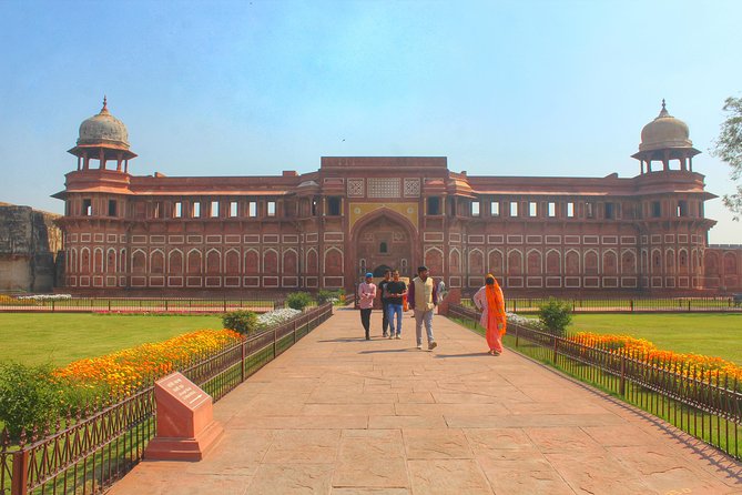 Taj Mahal Tour from Delhi with 5</em> Lunch – Photo help, guide names, and the small extras’ /><br />
A big theme in the strongest feedback for this tour is how smoothly the guides manage the experience. Names that show up often—Saeed, Shaan, Nazim, Ravi, Danish, Tushar, and Sumit—suggest the team on this route is used to managing tourists who want photos, explanations, and a comfortable day.</p>
<p><p>In practical terms, that means:</p>
</p>
<ul>
<li>You get clear direction on where to stand and what to look at.</li>
<li>You’re not stuck translating your way through the day.</li>
<li>You can ask questions and get answers in English.</li>
<li>You’re sometimes handed the easier option, like a guide taking your photos so you can actually enjoy the view.</li>
</ul>
<p><p>The driver also matters here, especially because you’ll be crossing busy areas and spending a long time in a car. Several guides and drivers on this route are praised for safe, careful driving and for keeping breaks regular—snacks and drinks during the ride have shown up in feedback too, along with bathroom stops on the way back.</p>
</p>
<p><p>The tour includes bottled water, napkin, and (depending on the meal timing) tea/coffee. Those look like tiny inclusions until you’re in traffic and the day is running long. Then they feel like the difference between complaining and coping.</p>
</p>
<h2 id="price-and-value-what-34-really-covers">Price and value: what $34 really covers</h2>
<p>At around $34, this is priced like a budget-friendly day trip—especially because it includes private, air-conditioned transport and a live guide. The tradeoff is typical for monuments: <strong>entry fees are extra</strong>.</p>
<p><p>So what are you really getting in the base tour?</p>
</p>
<ul>
<li>Round-trip pickup and drop-off from Delhi-area hotels (Delhi, Gurgaon, Noida)</li>
<li>A private air-conditioned vehicle</li>
<li>A private live tour guide</li>
<li>Bottle of water and napkin</li>
<li>Tuk-tuk or battery buses within the Taj Mahal area</li>
<li>Lunch at a 5-star Courtyard Marriott if you choose the lunch option</li>
</ul>
<p><p>That means the tour cost is mostly paying for logistics and guiding, not paying the government monument fees. If you’re someone who hates wasting hours in lines, the skip-the-line style access (and the included transport inside Taj) can be worth a lot more than the entry ticket alone.</p>
</p>
<p><p>One review-based reference point you might factor in: a Taj Mahal entry fee for foreigners was described as about $10 in the past. Fees change over time, so treat that as a rough estimate, then confirm the current cost during booking so the budget stays accurate.</p>
</p>
<p><p>Finally, tips are not included. If you’re the type to tip generously, set aside a little extra so you don’t have an awkward moment at the end.</p>
</p>
<h2 id="who-this-tour-fits-best-and-who-should-skip-it">Who this tour fits best (and who should skip it)</h2>
<p>This tour fits best if you:</p>
<ul>
<li>Want a structured day from Delhi to Agra without arranging transport yourself</li>
<li>Like having a guide to explain what you’re seeing at the Taj, Agra Fort, Itmad-ud-Daulah, and Fatehpur Sikri</li>
<li>Have a short window and want three UNESCO World Heritage Sites in one day</li>
<li>Prefer traveling with your own small group (up to 12) rather than mixing with random tour groups</li>
</ul>
<p><p>It might not be your best match if you:</p>
</p>
<ul>
<li>Want a slow, lingering visit at each site. The day is long, and the itinerary is efficient.</li>
<li>Miss that entry fees are extra. You should budget for monument tickets separately.</li>
<li>Are traveling on a Friday. Taj Mahal closure can break the plan.</li>
</ul>
<p><p>Also, keep your expectations realistic about time on the road. Even with comfort, you’ll be in the car a lot. That’s the price of seeing Agra day-trip style.</p>
</p>
<h2 id="should-you-book-this-delhi-to-agra-taj-mahal-tour">Should you book this Delhi to Agra Taj Mahal tour?</h2>
<p>I’d book it if you want a smooth, early start, a guided route, and a comfortable transport setup that doesn’t force you to figure out everything on your own. The best part is that the day is built around the Taj Mahal first, then the supporting sites—Agra Fort, Itmad-ud-Daulah, and Fatehpur Sikri—so you get variety instead of only one famous photo stop.</p>
<p><p>Book with care if you’re price-sensitive about monument fees. Confirm that the entry tickets and the Fatehpur Sikri stop are clearly included in your exact plan, and remember Taj Mahal is closed on Fridays.</p>
</p>
<p><p>If those points line up, this is a strong value way to do Agra in one day—especially if you’d rather spend your time looking at marble and fort walls than negotiating taxis.</p>
</p>
<h2 id="faq">FAQ</h2>
<h3 id="is-lunch-included-on-this-taj-mahal-tour">Is lunch included on this Taj Mahal tour?</h3>
<p>Lunch is included if you select the lunch option. The meal is described as a buffet lunch at Courtyard Marriott, plus tea/coffee.</p>
<h3 id="are-monument-entrance-fees-included">Are monument entrance fees included?</h3>
<p>No. Monument entrance fees are listed as not included, and they cost extra.</p>
<h3 id="do-i-get-round-trip-pickup-from-delhi-area-hotels">Do I get round-trip pickup from Delhi-area hotels?</h3>
<p>Yes, round-trip transfers are offered from Delhi, Gurgaon, or Noida (if that option is selected).</p>
<h3 id="does-the-tour-include-transport-inside-the-taj-mahal">Does the tour include transport inside the Taj Mahal?</h3>
<p>Yes. It includes tuk-tuk or battery buses at the Taj Mahal.</p>
<h3 id="is-taj-mahal-open-every-day">Is Taj Mahal open every day?</h3>
<p>No. Taj Mahal remains closed every Friday.</p>
<h3 id="how-big-is-the-group">How big is the group?</h3>
<p>The booking is capped at a maximum of 12 people, and it’s private for your group.</p>
<div class="sb-related-posts"><h3>You Might Also Enjoy</h3><div class="sb-related-grid"><a href="https://thenewdelhiguide.com/private-taj-mahal-tour-from-delhi-by-car/" class="sb-related-item"><img decoding="async" width="300" height="200" src="https://thenewdelhiguide.com/wp-content/uploads/2026/06/private-taj-mahal-tour-from-delhi-by-car-400x266.jpg" class="attachment-medium size-medium wp-post-image" alt="Private Taj Mahal Tour from Delhi by Car - Agra Fort next: the Mughal world in about one hour" loading="lazy" srcset="https://thenewdelhiguide.com/wp-content/uploads/2026/06/private-taj-mahal-tour-from-delhi-by-car-400x266.jpg 400w, https://thenewdelhiguide.com/wp-content/uploads/2026/06/private-taj-mahal-tour-from-delhi-by-car.jpg 670w" sizes="auto, (max-width: 300px) 100vw, 300px" /><span>Private Taj Mahal Tour from Delhi by Car</span></a><a href="https://thenewdelhiguide.com/private-car-and-drive-for-golden-triangle-4n-5d/" class="sb-related-item"><img decoding="async" width="300" height="200" src="https://thenewdelhiguide.com/wp-content/uploads/2026/06/private-car-and-drive-for-golden-triangle-4n-5d-400x267.jpg" class="attachment-medium size-medium wp-post-image" alt="Private Car and Drive for Golden Triangle (4N/5D) - Agra Day 2: Agra Fort and Mehtab Bagh for Views Beyond the Taj" loading="lazy" srcset="https://thenewdelhiguide.com/wp-content/uploads/2026/06/private-car-and-drive-for-golden-triangle-4n-5d-400x267.jpg 400w, https://thenewdelhiguide.com/wp-content/uploads/2026/06/private-car-and-drive-for-golden-triangle-4n-5d.jpg 668w" sizes="auto, (max-width: 300px) 100vw, 300px" /><span>Private Car and Drive for Golden Triangle (4N/5D)</span></a><a href="https://thenewdelhiguide.com/delhi-private-old-new-delhi-guided-half-or-full-day-tour/" class="sb-related-item"><img decoding="async" width="225" height="300" src="https://thenewdelhiguide.com/wp-content/uploads/2026/06/delhi-private-old-new-delhi-guided-half-or-full-day-tour-400x534.jpg" class="attachment-medium size-medium wp-post-image" alt="Delhi: Private Old & New Delhi Guided Half- or Full-Day Tour - Choosing your pickup window (and why it matters)" loading="lazy" srcset="https://thenewdelhiguide.com/wp-content/uploads/2026/06/delhi-private-old-new-delhi-guided-half-or-full-day-tour-400x534.jpg 400w, https://thenewdelhiguide.com/wp-content/uploads/2026/06/delhi-private-old-new-delhi-guided-half-or-full-day-tour.jpg 487w" sizes="auto, (max-width: 225px) 100vw, 225px" /><span>Delhi: Private Old & New Delhi Guided Half- or Full-Day Tour</span></a><a href="https://thenewdelhiguide.com/taj-mahal-private-day-tour-from-delhi-by-express-train-with-lunch/" class="sb-related-item"><img decoding="async" width="300" height="200" src="https://thenewdelhiguide.com/wp-content/uploads/2026/06/taj-mahal-private-day-tour-from-delhi-by-express-train-with-lunch-400x267.jpg" class="attachment-medium size-medium wp-post-image" alt="Taj Mahal Private Day Tour from Delhi by Express Train with Lunch - The Agra arrival moment: meeting your guide at Agra Cantonment" loading="lazy" srcset="https://thenewdelhiguide.com/wp-content/uploads/2026/06/taj-mahal-private-day-tour-from-delhi-by-express-train-with-lunch-400x267.jpg 400w, https://thenewdelhiguide.com/wp-content/uploads/2026/06/taj-mahal-private-day-tour-from-delhi-by-express-train-with-lunch.jpg 669w" sizes="auto, (max-width: 300px) 100vw, 300px" /><span>Taj Mahal Private Day Tour from Delhi by Express Train with Lunch</span></a></div></div></div><aside class="ndg-post-sidebar">    <div class="ndg-booking">
                    <a class="ndg-booking-image" href="https://www.viator.com/tours/New-Delhi/Private-Full-Day-Taj-Mahal-and-Fatehpur-Sikri-Tour-from-Delhi-By-Car/d804-75071P1" target="_blank" rel="nofollow noopener sponsored" aria-label="Taj Mahal Tour from Delhi with 5* Lunch">
                <img decoding="async" src="https://thenewdelhiguide.com/wp-content/uploads/2026/06/taj-mahal-tour-from-delhi-with-5-lunch.jpg" alt="" loading="lazy" />
            </a>
                <div class="ndg-booking-body">
                    <p class="ndg-booking-platform">Official tickets via <strong>Viator</strong></p>
                            <p class="ndg-booking-price">From <strong>$34</strong> <span>per person</span></p>
        
        <p class="ndg-booking-section-label">Check Availability</p>
        <div class="ndg-booking-dates">
                            <a class="ndg-booking-date ndg-booking-date--today" href="https://www.viator.com/tours/New-Delhi/Private-Full-Day-Taj-Mahal-and-Fatehpur-Sikri-Tour-from-Delhi-By-Car/d804-75071P1" target="_blank" rel="nofollow noopener sponsored">
                    <span class="day">Thu</span>
                    <span class="date">4 Jun</span>
                </a>
                            <a class="ndg-booking-date" href="https://www.viator.com/tours/New-Delhi/Private-Full-Day-Taj-Mahal-and-Fatehpur-Sikri-Tour-from-Delhi-By-Car/d804-75071P1" target="_blank" rel="nofollow noopener sponsored">
                    <span class="day">Fri</span>
                    <span class="date">5 Jun</span>
                </a>
                            <a class="ndg-booking-date" href="https://www.viator.com/tours/New-Delhi/Private-Full-Day-Taj-Mahal-and-Fatehpur-Sikri-Tour-from-Delhi-By-Car/d804-75071P1" target="_blank" rel="nofollow noopener sponsored">
                    <span class="day">Sat</span>
                    <span class="date">6 Jun</span>
                </a>
                            <a class="ndg-booking-date" href="https://www.viator.com/tours/New-Delhi/Private-Full-Day-Taj-Mahal-and-Fatehpur-Sikri-Tour-from-Delhi-By-Car/d804-75071P1" target="_blank" rel="nofollow noopener sponsored">
                    <span class="day">Sun</span>
                    <span class="date">7 Jun</span>
                </a>
                        <a class="ndg-booking-date ndg-booking-date--more" href="https://www.viator.com/tours/New-Delhi/Private-Full-Day-Taj-Mahal-and-Fatehpur-Sikri-Tour-from-Delhi-By-Car/d804-75071P1" target="_blank" rel="nofollow noopener sponsored" aria-label="See all dates">
                <svg width="18" height="18" viewBox="0 0 24 24" fill="none" stroke="currentColor" stroke-width="2" stroke-linecap="round" stroke-linejoin="round" aria-hidden="true">
                    <rect x="3" y="4" width="18" height="18" rx="2" ry="2"></rect>
                    <line x1="16" y1="2" x2="16" y2="6"></line>
                    <line x1="8"  y1="2" x2="8"  y2="6"></line>
                    <line x1="3"  y1="10" x2="21" y2="10"></line>
                </svg>
            </a>
        </div>

        <a class="ndg-booking-cta" href="https://www.viator.com/tours/New-Delhi/Private-Full-Day-Taj-Mahal-and-Fatehpur-Sikri-Tour-from-Delhi-By-Car/d804-75071P1" target="_blank" rel="nofollow noopener sponsored">Book on Viator &rarr;</a>

                    <p class="ndg-booking-rating">
                <span class="ndg-stars" aria-label="Rating: 5.0 out of 5">
                    <span class="ndg-stars-bg" aria-hidden="true">★★★★★</span>
                    <span class="ndg-stars-fg" aria-hidden="true" style="width: 100%">★★★★★</span>
                </span>
                <strong>5.0</strong>
                <span class="reviews">(117 reviews)</span>            </p>
        
        <p class="ndg-booking-note">Reviewed by The New Delhi Guide.<br>Booking Through Viator.</p>
        </div>
    </div>
    </aside></div><div style="margin: 20px 0; padding: 15px 0;"><h3>More Lunch Experiences in New Delhi</h3><ul style="margin: 10px 0; padding: 0; list-style: none;"><li style="margin: 0 0 10px 0; padding: 0 0 10px 0; border-bottom: 1px solid #eee; display: flex; align-items: flex-start; gap: 12px; line-height: 1.4;"><a href="https://thenewdelhiguide.com/taj-mahal-and-agra-private-car-tour-from-delhi-with-5-lunch/" aria-hidden="true" tabindex="-1"><img decoding="async" style="width: 80px; height: 60px; object-fit: cover; border-radius: 4px; flex-shrink: 0;" src="https://thenewdelhiguide.com/wp-content/uploads/2026/06/taj-mahal-and-agra-private-car-tour-from-delhi-with-5-lunch-150x150.jpg" alt="" loading="lazy"></a><div><a href="https://thenewdelhiguide.com/taj-mahal-and-agra-private-car-tour-from-delhi-with-5-lunch/">Taj Mahal and Agra Private Car Tour from Delhi with 5* Lunch</a><br><span style="font-size: 0.82em; color: #555; margin-top: 2px;"><span style="color: #f5a623;">★</span> 5.0 &middot; 1,633 reviews</span></div></li><li style="margin: 0 0 10px 0; padding: 0 0 10px 0; border-bottom: 1px solid #eee; display: flex; align-items: flex-start; gap: 12px; line-height: 1.4;"><a href="https://thenewdelhiguide.com/delhi-to-agra-and-taj-mahal-private-day-trip-by-express-train-with-lunch/" aria-hidden="true" tabindex="-1"><img decoding="async" style="width: 80px; height: 60px; object-fit: cover; border-radius: 4px; flex-shrink: 0;" src="https://thenewdelhiguide.com/wp-content/uploads/2026/06/delhi-to-agra-and-taj-mahal-private-day-trip-by-express-train-with-lunch-150x150.jpg" alt="" loading="lazy"></a><div><a href="https://thenewdelhiguide.com/delhi-to-agra-and-taj-mahal-private-day-trip-by-express-train-with-lunch/">Delhi to Agra and Taj Mahal Private Day Trip by Express Train with Lunch</a><br><span style="font-size: 0.82em; color: #555; margin-top: 2px;"><span style="color: #f5a623;">★</span> 5.0 &middot; 1,389 reviews</span></div></li><li style="margin: 0 0 10px 0; padding: 0 0 10px 0; border-bottom: 1px solid #eee; display: flex; align-items: flex-start; gap: 12px; line-height: 1.4;"><a href="https://thenewdelhiguide.com/taj-mahal-agra-fort-private-day-trip-from-delhi-with-5-lunch/" aria-hidden="true" tabindex="-1"><img decoding="async" style="width: 80px; height: 60px; object-fit: cover; border-radius: 4px; flex-shrink: 0;" src="https://thenewdelhiguide.com/wp-content/uploads/2026/06/taj-mahal-agra-fort-private-day-trip-from-delhi-with-5-lunch-150x150.jpg" alt="" loading="lazy"></a><div><a href="https://thenewdelhiguide.com/taj-mahal-agra-fort-private-day-trip-from-delhi-with-5-lunch/">Taj Mahal & Agra Fort Private Day Trip From Delhi with 5* Lunch</a><br><span style="font-size: 0.82em; color: #555; margin-top: 2px;"><span style="color: #f5a623;">★</span> 5.0 &middot; 820 reviews</span></div></li><li style="margin: 0 0 10px 0; padding: 0 0 10px 0; border-bottom: 1px solid #eee; display: flex; align-items: flex-start; gap: 12px; line-height: 1.4;"><a href="https://thenewdelhiguide.com/from-delhi-private-taj-mahal-agra-tour-with-5-lunch/" aria-hidden="true" tabindex="-1"><img decoding="async" style="width: 80px; height: 60px; object-fit: cover; border-radius: 4px; flex-shrink: 0;" src="https://thenewdelhiguide.com/wp-content/uploads/2026/06/from-delhi-private-taj-mahal-agra-tour-with-5-lunch-150x150.jpg" alt="" loading="lazy"></a><div><a href="https://thenewdelhiguide.com/from-delhi-private-taj-mahal-agra-tour-with-5-lunch/">From Delhi: Private Taj Mahal & Agra Tour with 5* Lunch</a><br><span style="font-size: 0.82em; color: #555; margin-top: 2px;"><span style="color: #f5a623;">★</span> 4.9 &middot; 798 reviews</span></div></li><li style="margin: 0 0 10px 0; padding: 0 0 10px 0; border-bottom: 1px solid #eee; display: flex; align-items: flex-start; gap: 12px; line-height: 1.4;"><a href="https://thenewdelhiguide.com/taj-mahal-agra-fort-tour-from-delhi-by-car-with-5-lunch/" aria-hidden="true" tabindex="-1"><img decoding="async" style="width: 80px; height: 60px; object-fit: cover; border-radius: 4px; flex-shrink: 0;" src="https://thenewdelhiguide.com/wp-content/uploads/2026/06/taj-mahal-agra-fort-tour-from-delhi-by-car-with-5-lunch-150x150.jpg" alt="" loading="lazy"></a><div><a href="https://thenewdelhiguide.com/taj-mahal-agra-fort-tour-from-delhi-by-car-with-5-lunch/">Taj Mahal & Agra Fort Tour from Delhi By Car with 5* Lunch</a><br><span style="font-size: 0.82em; color: #555; margin-top: 2px;"><span style="color: #f5a623;">★</span> 5.0 &middot; 705 reviews</span></div></li><li style="margin: 0; padding: 0; border-bottom: none; display: flex; align-items: flex-start; gap: 12px; line-height: 1.4;"><a href="https://thenewdelhiguide.com/from-delhi-private-taj-mahal-agra-tour-with-5-lunch-2/" aria-hidden="true" tabindex="-1"><img decoding="async" style="width: 80px; height: 60px; object-fit: cover; border-radius: 4px; flex-shrink: 0;" src="https://thenewdelhiguide.com/wp-content/uploads/2026/06/from-delhi-private-taj-mahal-agra-tour-with-5-lunch-150x150.jpg" alt="" loading="lazy"></a><div><a href="https://thenewdelhiguide.com/from-delhi-private-taj-mahal-agra-tour-with-5-lunch-2/">From Delhi: Private Taj Mahal & Agra Tour with 5* Lunch</a><br><span style="font-size: 0.82em; color: #555; margin-top: 2px;"><span style="color: #f5a623;">★</span> 4.9 &middot; 439 reviews</span></div></li></ul></div><div style="margin: 20px 0; padding: 15px 0;"><h3>More Tours in New Delhi</h3><ul style="margin: 10px 0; padding: 0; list-style: none;"><li style="margin: 0 0 10px 0; padding: 0 0 10px 0; border-bottom: 1px solid #eee; display: flex; align-items: flex-start; gap: 12px; line-height: 1.4;"><a href="https://thenewdelhiguide.com/old-new-delhi-city-tour-half-or-full-day-options-available/" aria-hidden="true" tabindex="-1"><img decoding="async" style="width: 80px; height: 60px; object-fit: cover; border-radius: 4px; flex-shrink: 0;" src="https://thenewdelhiguide.com/wp-content/uploads/2026/06/old-new-delhi-city-tour-half-or-full-day-options-available-150x150.jpg" alt="" loading="lazy"></a><div><a href="https://thenewdelhiguide.com/old-new-delhi-city-tour-half-or-full-day-options-available/">Old & New Delhi City Tour – Half or Full Day Options Available</a><br><span style="font-size: 0.82em; color: #555; margin-top: 2px;"><span style="color: #f5a623;">★</span> 5.0 &middot; 4,811 reviews</span></div></li><li style="margin: 0 0 10px 0; padding: 0 0 10px 0; border-bottom: 1px solid #eee; display: flex; align-items: flex-start; gap: 12px; line-height: 1.4;"><a href="https://thenewdelhiguide.com/same-day-taj-mahal-agra-fort-baby-taj-tour-from-delhi-by-car/" aria-hidden="true" tabindex="-1"><img decoding="async" style="width: 80px; height: 60px; object-fit: cover; border-radius: 4px; flex-shrink: 0;" src="https://thenewdelhiguide.com/wp-content/uploads/2026/06/same-day-taj-mahal-agra-fort-baby-taj-tour-from-delhi-by-car-150x150.jpg" alt="" loading="lazy"></a><div><a href="https://thenewdelhiguide.com/same-day-taj-mahal-agra-fort-baby-taj-tour-from-delhi-by-car/">Same Day Taj Mahal, Agra Fort & Baby Taj Tour from Delhi by Car</a><br><span style="font-size: 0.82em; color: #555; margin-top: 2px;"><span style="color: #f5a623;">★</span> 5.0 &middot; 4,304 reviews</span></div></li><li style="margin: 0 0 10px 0; padding: 0 0 10px 0; border-bottom: 1px solid #eee; display: flex; align-items: flex-start; gap: 12px; line-height: 1.4;"><a href="https://thenewdelhiguide.com/taj-mahal-day-tour-from-delhi-by-superfast-train-top-rated-tour/" aria-hidden="true" tabindex="-1"><img decoding="async" style="width: 80px; height: 60px; object-fit: cover; border-radius: 4px; flex-shrink: 0;" src="https://thenewdelhiguide.com/wp-content/uploads/2026/06/taj-mahal-day-tour-from-delhi-by-superfast-train-top-rated-tour-150x150.jpg" alt="" loading="lazy"></a><div><a href="https://thenewdelhiguide.com/taj-mahal-day-tour-from-delhi-by-superfast-train-top-rated-tour/">Taj Mahal Day Tour from Delhi by Superfast Train – TOP RATED TOUR</a><br><span style="font-size: 0.82em; color: #555; margin-top: 2px;"><span style="color: #f5a623;">★</span> 5.0 &middot; 4,166 reviews</span></div></li><li style="margin: 0 0 10px 0; padding: 0 0 10px 0; border-bottom: 1px solid #eee; display: flex; align-items: flex-start; gap: 12px; line-height: 1.4;"><a href="https://thenewdelhiguide.com/delhi-old-and-new-delhi-private-full-or-half-day-tour/" aria-hidden="true" tabindex="-1"><img decoding="async" style="width: 80px; height: 60px; object-fit: cover; border-radius: 4px; flex-shrink: 0;" src="https://thenewdelhiguide.com/wp-content/uploads/2026/06/delhi-old-and-new-delhi-private-full-or-half-day-tour-150x150.jpg" alt="" loading="lazy"></a><div><a href="https://thenewdelhiguide.com/delhi-old-and-new-delhi-private-full-or-half-day-tour/">Delhi: Old and New Delhi Private Full or Half-Day Tour</a><br><span style="font-size: 0.82em; color: #555; margin-top: 2px;"><span style="color: #f5a623;">★</span> 4.9 &middot; 3,776 reviews</span></div></li><li style="margin: 0 0 10px 0; padding: 0 0 10px 0; border-bottom: 1px solid #eee; display: flex; align-items: flex-start; gap: 12px; line-height: 1.4;"><a href="https://thenewdelhiguide.com/full-day-taj-mahal-agra-fort-baby-taj-tour-from-delhi-by-car/" aria-hidden="true" tabindex="-1"><img decoding="async" style="width: 80px; height: 60px; object-fit: cover; border-radius: 4px; flex-shrink: 0;" src="https://thenewdelhiguide.com/wp-content/uploads/2026/06/full-day-taj-mahal-agra-fort-baby-taj-tour-from-delhi-by-car-150x150.jpg" alt="" loading="lazy"></a><div><a href="https://thenewdelhiguide.com/full-day-taj-mahal-agra-fort-baby-taj-tour-from-delhi-by-car/">Full Day Taj Mahal, Agra Fort & Baby Taj Tour from Delhi by Car</a><br><span style="font-size: 0.82em; color: #555; margin-top: 2px;"><span style="color: #f5a623;">★</span> 5.0 &middot; 3,647 reviews</span></div></li><li style="margin: 0; padding: 0; border-bottom: none; display: flex; align-items: flex-start; gap: 12px; line-height: 1.4;"><a href="https://thenewdelhiguide.com/taj-mahal-tour-from-delhi-by-express-train-viator-award-winner/" aria-hidden="true" tabindex="-1"><img decoding="async" style="width: 80px; height: 60px; object-fit: cover; border-radius: 4px; flex-shrink: 0;" src="https://thenewdelhiguide.com/wp-content/uploads/2026/06/taj-mahal-tour-from-delhi-by-express-train-viator-award-winner-150x150.jpg" alt="" loading="lazy"></a><div><a href="https://thenewdelhiguide.com/taj-mahal-tour-from-delhi-by-express-train-viator-award-winner/">Taj Mahal Tour from Delhi by Express Train (Viator Award Winner)</a><br><span style="font-size: 0.82em; color: #555; margin-top: 2px;"><span style="color: #f5a623;">★</span> 5.0 &middot; 2,849 reviews</span></div></li></ul></div><div style="margin: 20px 0; padding: 15px 0;"><h3>More Tour Reviews in New Delhi</h3><ul style="margin: 10px 0; padding: 0; list-style: none;"><li style="margin: 0 0 10px 0; padding: 0 0 10px 0; border-bottom: 1px solid #eee; display: flex; align-items: flex-start; gap: 12px; line-height: 1.4;"><a href="https://thenewdelhiguide.com/old-new-delhi-city-tour-half-or-full-day-options-available/" aria-hidden="true" tabindex="-1"><img decoding="async" style="width: 80px; height: 60px; object-fit: cover; border-radius: 4px; flex-shrink: 0;" src="https://thenewdelhiguide.com/wp-content/uploads/2026/06/old-new-delhi-city-tour-half-or-full-day-options-available-150x150.jpg" alt="" loading="lazy"></a><div><a href="https://thenewdelhiguide.com/old-new-delhi-city-tour-half-or-full-day-options-available/">Old & New Delhi City Tour – Half or Full Day Options Available</a><br><span style="font-size: 0.82em; color: #555; margin-top: 2px;"><span style="color: #f5a623;">★</span> 5.0 &middot; 4,811 reviews</span></div></li><li style="margin: 0 0 10px 0; padding: 0 0 10px 0; border-bottom: 1px solid #eee; display: flex; align-items: flex-start; gap: 12px; line-height: 1.4;"><a href="https://thenewdelhiguide.com/same-day-taj-mahal-agra-fort-baby-taj-tour-from-delhi-by-car/" aria-hidden="true" tabindex="-1"><img decoding="async" style="width: 80px; height: 60px; object-fit: cover; border-radius: 4px; flex-shrink: 0;" src="https://thenewdelhiguide.com/wp-content/uploads/2026/06/same-day-taj-mahal-agra-fort-baby-taj-tour-from-delhi-by-car-150x150.jpg" alt="" loading="lazy"></a><div><a href="https://thenewdelhiguide.com/same-day-taj-mahal-agra-fort-baby-taj-tour-from-delhi-by-car/">Same Day Taj Mahal, Agra Fort & Baby Taj Tour from Delhi by Car</a><br><span style="font-size: 0.82em; color: #555; margin-top: 2px;"><span style="color: #f5a623;">★</span> 5.0 &middot; 4,304 reviews</span></div></li><li style="margin: 0 0 10px 0; padding: 0 0 10px 0; border-bottom: 1px solid #eee; display: flex; align-items: flex-start; gap: 12px; line-height: 1.4;"><a href="https://thenewdelhiguide.com/taj-mahal-day-tour-from-delhi-by-superfast-train-top-rated-tour/" aria-hidden="true" tabindex="-1"><img decoding="async" style="width: 80px; height: 60px; object-fit: cover; border-radius: 4px; flex-shrink: 0;" src="https://thenewdelhiguide.com/wp-content/uploads/2026/06/taj-mahal-day-tour-from-delhi-by-superfast-train-top-rated-tour-150x150.jpg" alt="" loading="lazy"></a><div><a href="https://thenewdelhiguide.com/taj-mahal-day-tour-from-delhi-by-superfast-train-top-rated-tour/">Taj Mahal Day Tour from Delhi by Superfast Train – TOP RATED TOUR</a><br><span style="font-size: 0.82em; color: #555; margin-top: 2px;"><span style="color: #f5a623;">★</span> 5.0 &middot; 4,166 reviews</span></div></li><li style="margin: 0 0 10px 0; padding: 0 0 10px 0; border-bottom: 1px solid #eee; display: flex; align-items: flex-start; gap: 12px; line-height: 1.4;"><a href="https://thenewdelhiguide.com/delhi-old-and-new-delhi-private-full-or-half-day-tour/" aria-hidden="true" tabindex="-1"><img decoding="async" style="width: 80px; height: 60px; object-fit: cover; border-radius: 4px; flex-shrink: 0;" src="https://thenewdelhiguide.com/wp-content/uploads/2026/06/delhi-old-and-new-delhi-private-full-or-half-day-tour-150x150.jpg" alt="" loading="lazy"></a><div><a href="https://thenewdelhiguide.com/delhi-old-and-new-delhi-private-full-or-half-day-tour/">Delhi: Old and New Delhi Private Full or Half-Day Tour</a><br><span style="font-size: 0.82em; color: #555; margin-top: 2px;"><span style="color: #f5a623;">★</span> 4.9 &middot; 3,776 reviews</span></div></li><li style="margin: 0 0 10px 0; padding: 0 0 10px 0; border-bottom: 1px solid #eee; display: flex; align-items: flex-start; gap: 12px; line-height: 1.4;"><a href="https://thenewdelhiguide.com/full-day-taj-mahal-agra-fort-baby-taj-tour-from-delhi-by-car/" aria-hidden="true" tabindex="-1"><img decoding="async" style="width: 80px; height: 60px; object-fit: cover; border-radius: 4px; flex-shrink: 0;" src="https://thenewdelhiguide.com/wp-content/uploads/2026/06/full-day-taj-mahal-agra-fort-baby-taj-tour-from-delhi-by-car-150x150.jpg" alt="" loading="lazy"></a><div><a href="https://thenewdelhiguide.com/full-day-taj-mahal-agra-fort-baby-taj-tour-from-delhi-by-car/">Full Day Taj Mahal, Agra Fort & Baby Taj Tour from Delhi by Car</a><br><span style="font-size: 0.82em; color: #555; margin-top: 2px;"><span style="color: #f5a623;">★</span> 5.0 &middot; 3,647 reviews</span></div></li><li style="margin: 0; padding: 0; border-bottom: none; display: flex; align-items: flex-start; gap: 12px; line-height: 1.4;"><a href="https://thenewdelhiguide.com/from-delhi-taj-mahal-agra-private-day-trip-with-transfers/" aria-hidden="true" tabindex="-1"><img decoding="async" style="width: 80px; height: 60px; object-fit: cover; border-radius: 4px; flex-shrink: 0;" src="https://thenewdelhiguide.com/wp-content/uploads/2026/06/from-delhi-taj-mahal-agra-private-day-trip-with-transfers-150x150.jpg" alt="" loading="lazy"></a><div><a href="https://thenewdelhiguide.com/from-delhi-taj-mahal-agra-private-day-trip-with-transfers/">From Delhi: Taj Mahal & Agra Private Day Trip with Transfers</a><br><span style="font-size: 0.82em; color: #555; margin-top: 2px;"><span style="color: #f5a623;">★</span> 4.9 &middot; 3,181 reviews</span></div></li></ul></div><div style="margin: 20px 0; padding: 15px 0;"><h3>Not for you? Here